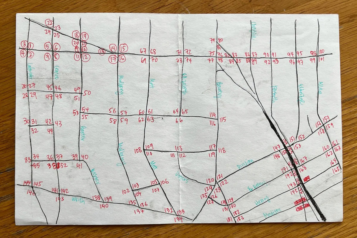 A hand-drawn map shows the route the reporting team would use to look for bilingual street signs that still exist.